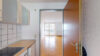 VERKAUFT: Gemütliche Zwei-Zimmer-Seniorenwohnung mit überdachtem Balkon in zentraler Wohnlage - Küche Wohn-Ess-Zimmer